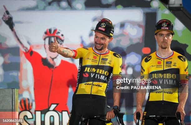 Team Jumbo-Visma Slovenian riders Primoz Roglic and Jan Tratnik stand on the stage during the official teams presentation of the 78th edition of 'La...