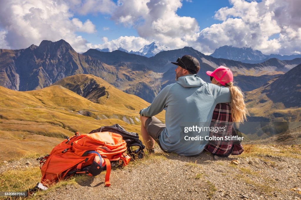A Couple Enjoying the Views in the Swiss Alps