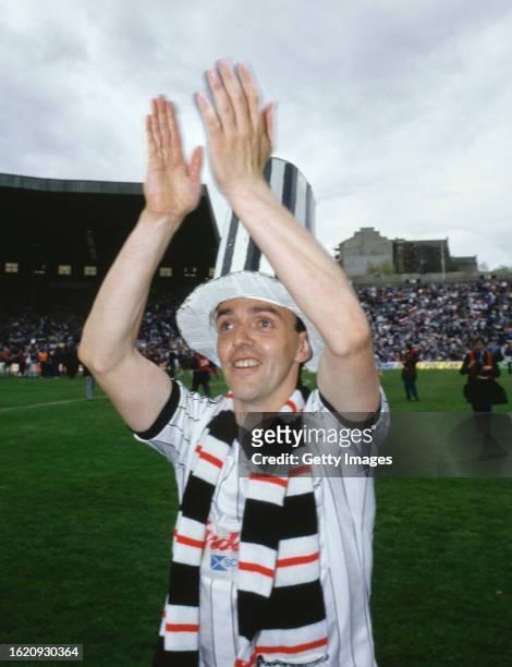 St Mirren striker Frank McGarvey celebrates on the pitch in a big hat after the 1987 Scottish Cup Final victory against Dundee United on May 16th,...
