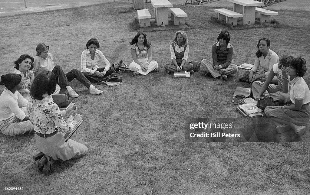 MAY 24 1977, JUN 2 1977, JUN 3 1977; Post Reporter Ann Bishop, left foreground, talks to Students in