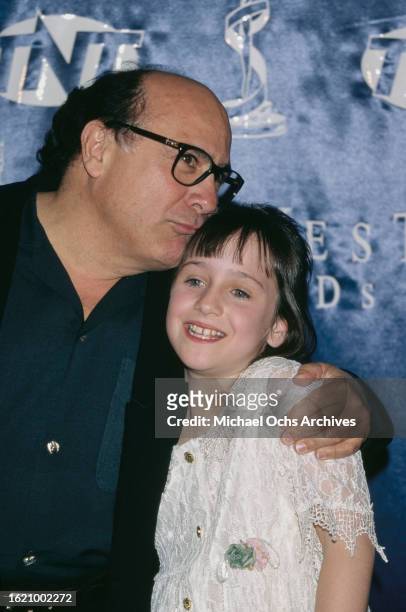 Danny DeVito and Mara Wilson attend and present at the 1997 ShoWest Awards, held at the MGM Grand Hotel in Las Vegas, Nevada, 6th March 1997.