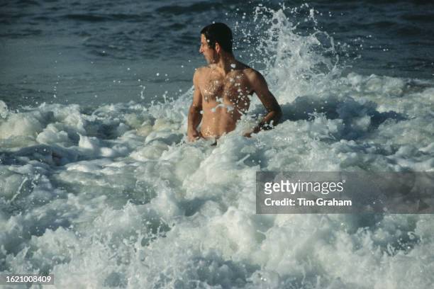 Prince Charles enjoys swimming in the sea at Bondi Beach during his tour in Sydney, Australia, 15th April 1981.