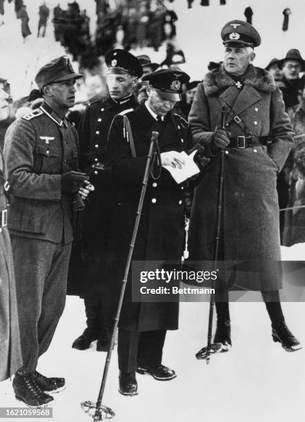 General Werner Von Blomberg watches the 1936 Winter Olympic Games, Garmisch-Partenkirchen, Bavaria, Germany, 17th February 1936.