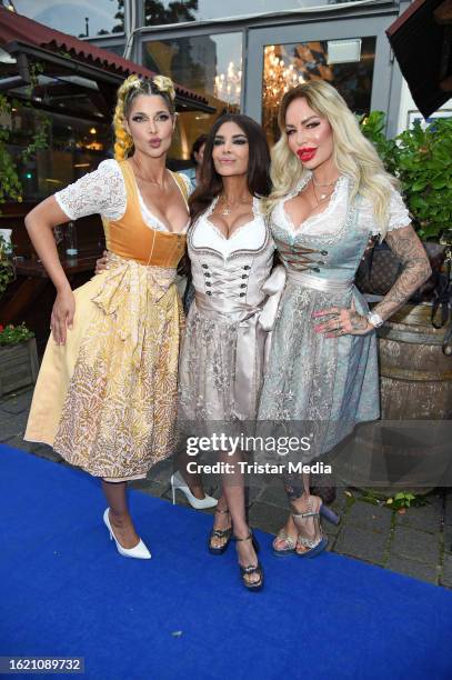 Micaela Schäfer, Kader Loth and Gina-Lisa Lohfink during the Angermaier Trachtennacht at Hofbräu Wirtshaus Berlin on August 24, 2023 in Berlin,...