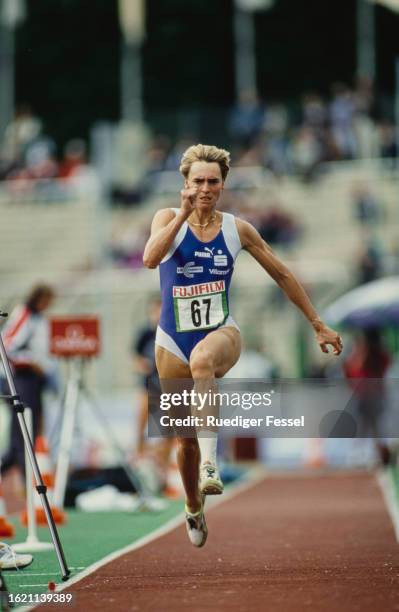 German athlete Heike Drechsler on the runway as she competes in the women's long jump event of an international athletics meeting, held at the...