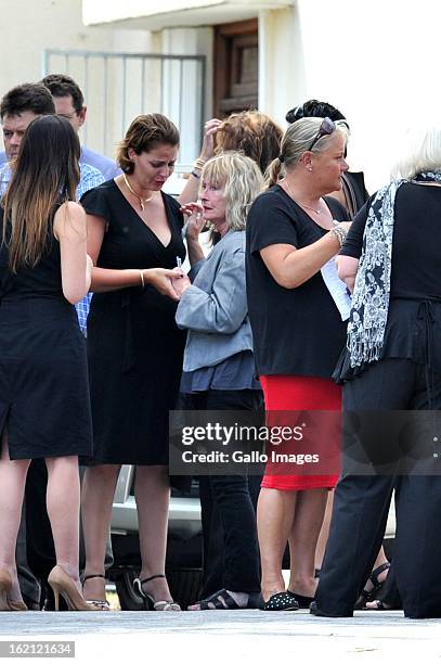 June Steenkamp, Reeva's mother, is comforted as she arrives at Reeva's memorial on February 19, 2013 in Port Elizabeth, South Africa. Steenkamp was...