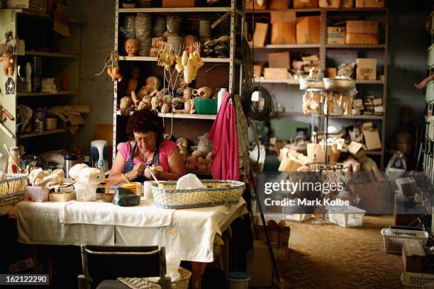 Gail Grainger works on a doll at Sydney's Original Doll Hospital in Bexley on February 19, 2013 in Sydney, Australia. Established in 1913 by Harold...