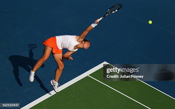 Sara Errani of Italy serves to Julia Goerges of Germany during day two of the WTA Dubai Duty Free Tennis Championship on February 19, 2013 in Dubai,...