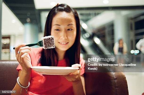 night time dessert - lamington cake stock pictures, royalty-free photos & images