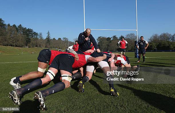 The England team practice their scrummaging during the England training session held at Pennyhill Park on February 19, 2013 in Bagshot, England.