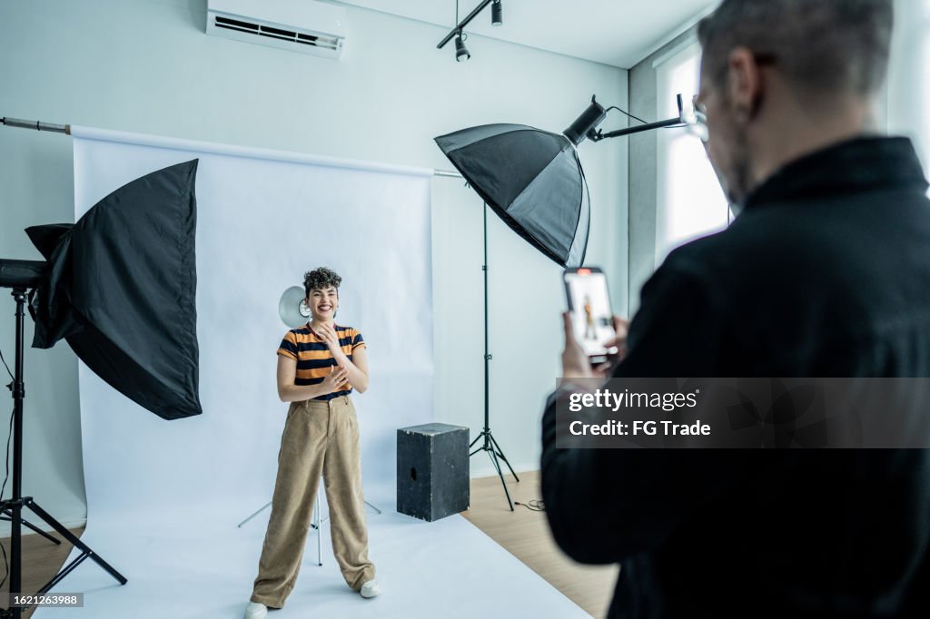 Filming Take Photographer Taking Photos Filming A Young Model Woman At Studio High ...