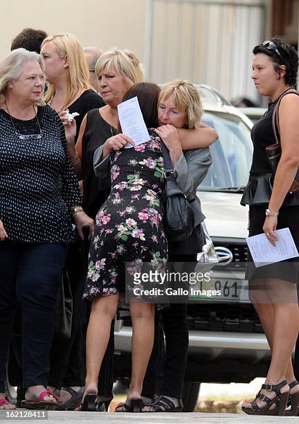 June Steenkamp, Reeva's mother, is comforted as she arrives at Reeva's memorial on February 19, 2013 in Port Elizabeth, South Africa. Steenkamp was...