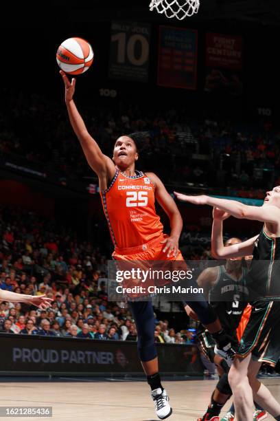 Alyssa Thomas of the Connecticut Sun drives to the basket during the game against the New York Liberty on August 24, 2023 at the Mohegan Sun Arena in...