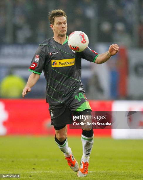 Thorben Marx of Moenchengladbach runs with the ball during the Bundesliga match between Hamburger SV and VfL Borussia Moenchengladbach at Imtech...