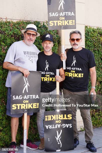 Alfred Molina, Matthew Wolf and Rufus Sewell walk the picket line in support of the SAG-AFTRA and WGA strike at Warner Bros. Studios on August 24,...