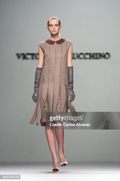 Model showcases designs by Victorio & Lucchino on the runway at the Victorio & Lucchino show during Mercedes Benz Fashion Week Madrid Fall/Winter...