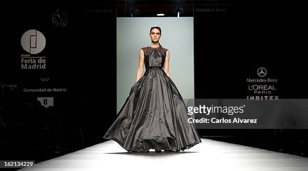 Model showcases designs by Victorio & Lucchino on the runway at the Victorio & Lucchino show during Mercedes Benz Fashion Week Madrid Fall/Winter...