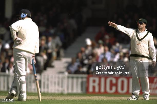 The two captains, Mike Atherton of England batting, and Mark Taylor of Australia setting the field, during the second Texaco One Day International...