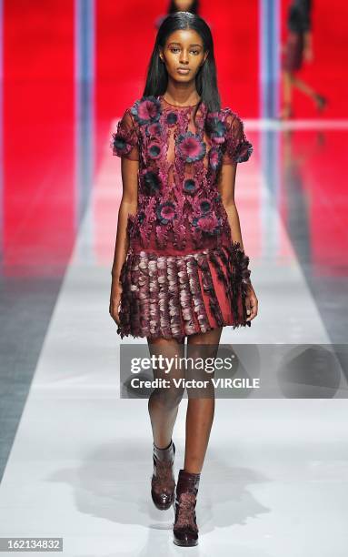 Model walks the runway at the Christopher Kane Ready to Wear Fall/Winter 2013-2014 show during London Fashion Week Fall/Winter 2013/14 at on February...