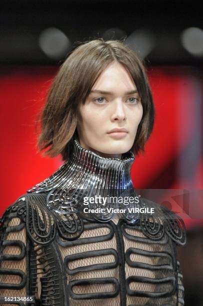 Model walks the runway at the Christopher Kane Ready to Wear Fall/Winter 2013-2014 show during London Fashion Week Fall/Winter 2013/14 at on February...