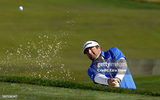 Steve Marino hits a bunker shot during the second round of the AT&T Pebble Beach National Pro-Am at the Monterey Peninsula Country Club on February...