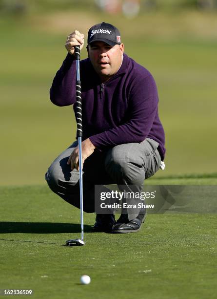 Kevin Stadler lines up a putt during the third round of the AT&T Pebble Beach National Pro-Am at Pebble Beach Golf Links on February 9, 2013 in...