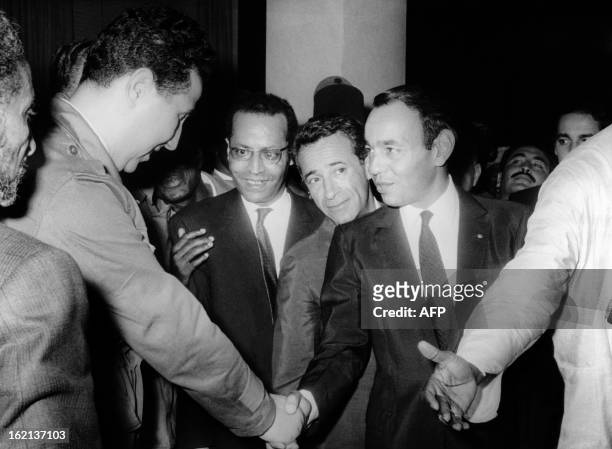 Picture taken on October 31, 1963 shows Algerian President Ahmed Ben Bella shaking hands with King Hassan II of Morocco after signing a cease-fire...