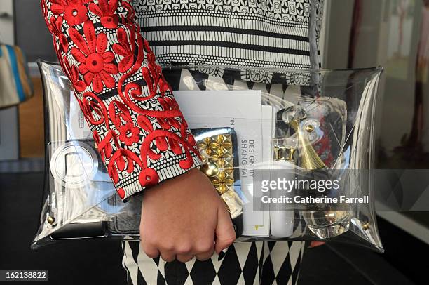 Hannah CrossKey, a student, wears a two tone ASOS suit, the jacket embellished with red applique floral motifs on the sleeves, accessorised with a...