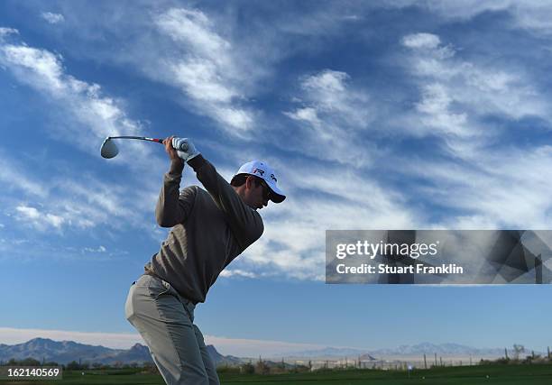 Justin Rose of England plays a shot during practice prior to the start of the World Golf Championships-Accenture Match Play Championship at the...