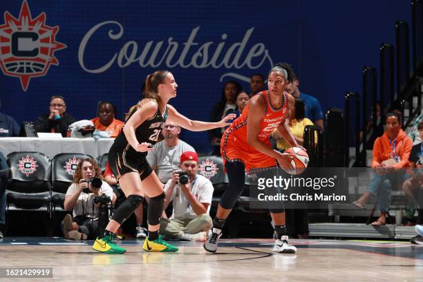 Alyssa Thomas of the Connecticut Sun looks to pass the ball during the game against the New York Liberty on August 24, 2023 at the Mohegan Sun Arena...