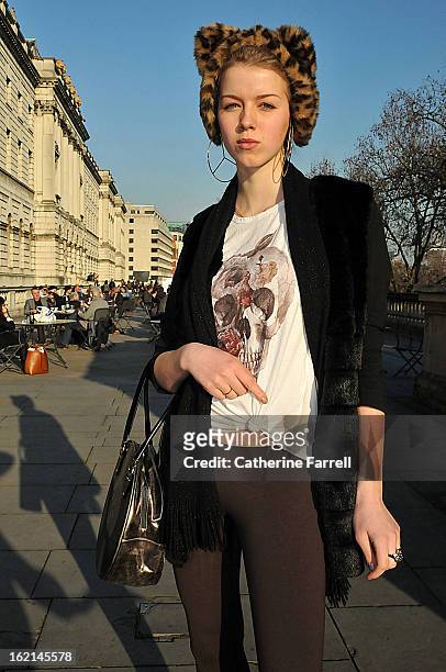 Paulina Soldeva, Fashion design student at Central Saint Martins, wearing James Lakeland gilet, Zara tee shirt, vintage scarf, accesorised with a bag...