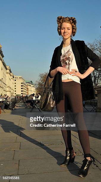 Paulina Soldeva, Fashion design student at Central Saint Martins, wearing James Lakeland gilet, Zara tee shirt, vintage scarf, accesorised with a bag...