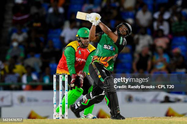 Azam Khan of Guyana Amazon Warriors takes the catch to dismiss Evin Lewis of Saint Kitts and Nevis Patriots during the Men's 2023 Republic Bank...