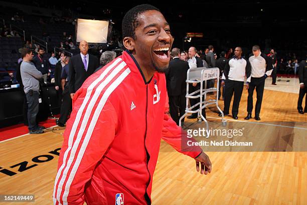 Jordan Crawford of the Washington Wizards has a laugh during pre-game warm-ups against the Toronto Raptors at the Verizon Center on February 19, 2013...