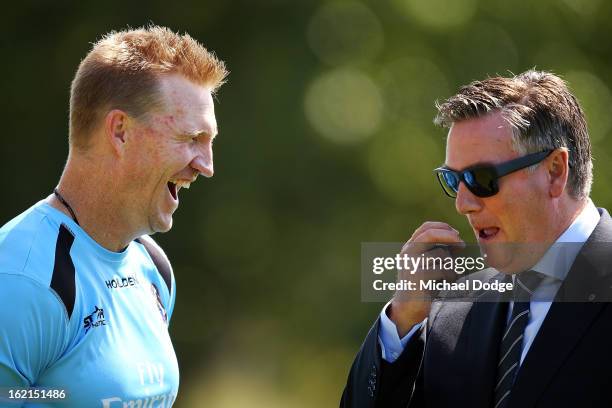 Coach Nathan Buckley reacts when talking with President Eddie McGuire during a Collingwood Magpies AFL training session at Gosch's Paddock on...