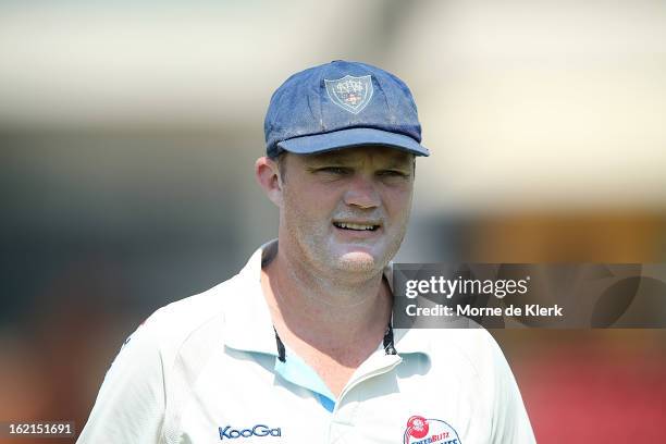 Doug Bollinger of the Blues looks on during day two of the Sheffield Shield match between the South Australian Redbacks and the New South Wales Blues...