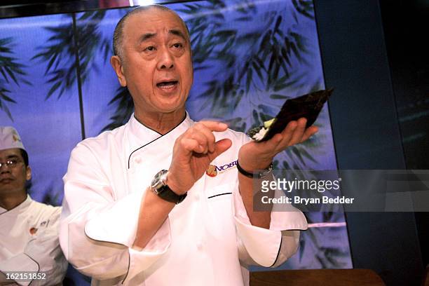 Chef Nobuyuki Matsuhisa demonstrates how to make hand rolls to guests at the Hand Roll Box event at Nobu Fifty Seven Balcony on February 19, 2013 in...