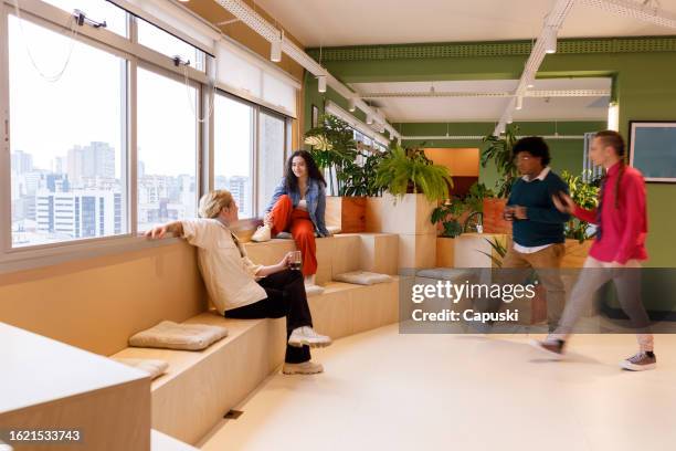 work team having a coffee break - publicidade stock pictures, royalty-free photos & images