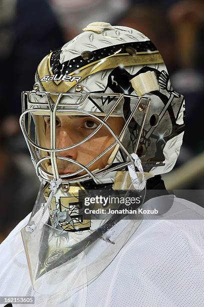 Marc-Andre Fleury of the Pittsburgh Penguins looks on during third period action against the Winnipeg Jets at the MTS Centre on February 15, 2013 in...