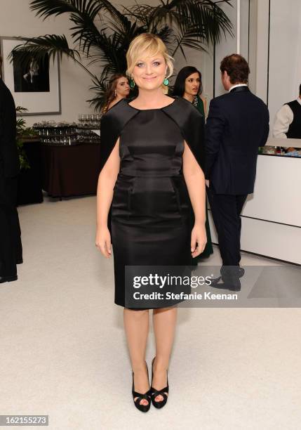 Actress Amy Poehler attends the 15th Annual Costume Designers Guild Awards with presenting sponsor Lacoste at The Beverly Hilton Hotel on February...