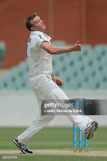 Doug Bollinger of the Blues bowls during day two of the Sheffield Shield match between the South Australian Redbacks and the New South Wales Blues at...