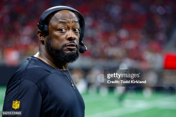 Head Coach Mike Tomlin of the Pittsburgh Steelers reacts during the second half of a preseason game against the Atlanta Falcons at Mercedes-Benz...