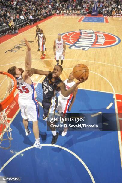 Ed Davis of the Memphis Grizzlies shoots against Viacheslav Kravtsov of the Detroit Pistons on February 19, 2013 at The Palace of Auburn Hills in...