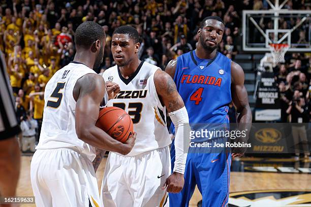 Earnest Ross and Keion Bell of the Missouri Tigers celebrate in the closing seconds of the game against the Florida Gators at Mizzou Arena on...