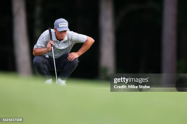William Mouw prepares to putt on the eighth green during the first round of the Magnit Championship at Metedeconk National Golf Club on August 17,...