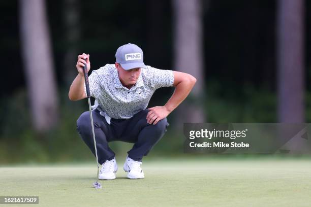 William Mouw prepares to putt on the eighth green during the first round of the Magnit Championship at Metedeconk National Golf Club on August 17,...