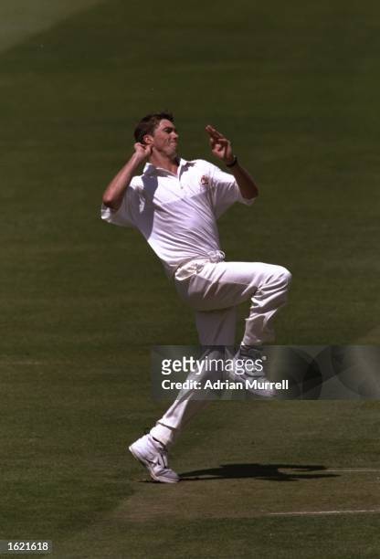 Glenn McGrath of Australia runs into bowl during the second test match against England at Lords Cricket Ground in London, England. The match ended in...