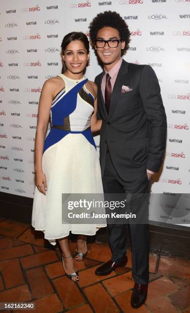 Actress Freida Pinto and DJ Trey Smith attend Vanity Fair and LOréal Paris-hosted D.J. Night with Freida Pinto in support of 10 x 10 and "Girl...