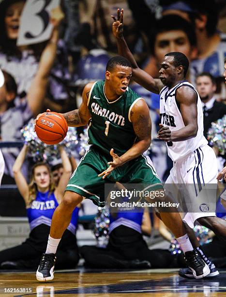 Darion Clark of the Charlotte 49ers dribbles against Khyle Marshall of the Butler Bulldogs at Hinkle Fieldhouse on February 13, 2013 in Indianapolis,...