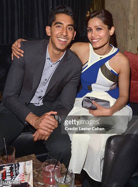 Actor Dev Patel and host Freida Pinto attend Vanity Fair and LOréal Paris-hosted D.J. Night with Freida Pinto in support of 10 x 10 and "Girl...